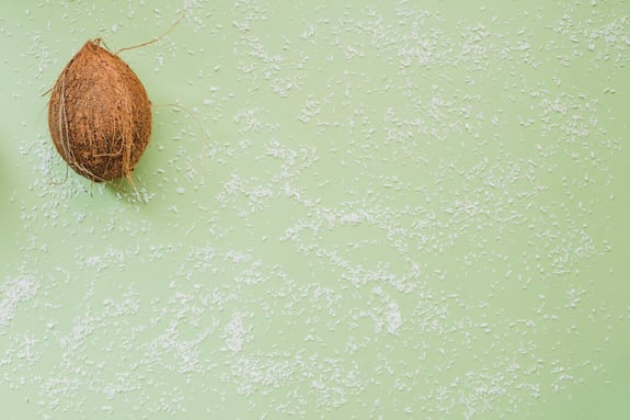 summer-composition-with-decorative-coconut-blank-space_23-2147636474